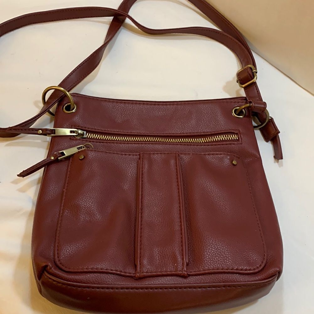 Faux leather shoulder adjustable to crossbody bag red.  NWOT